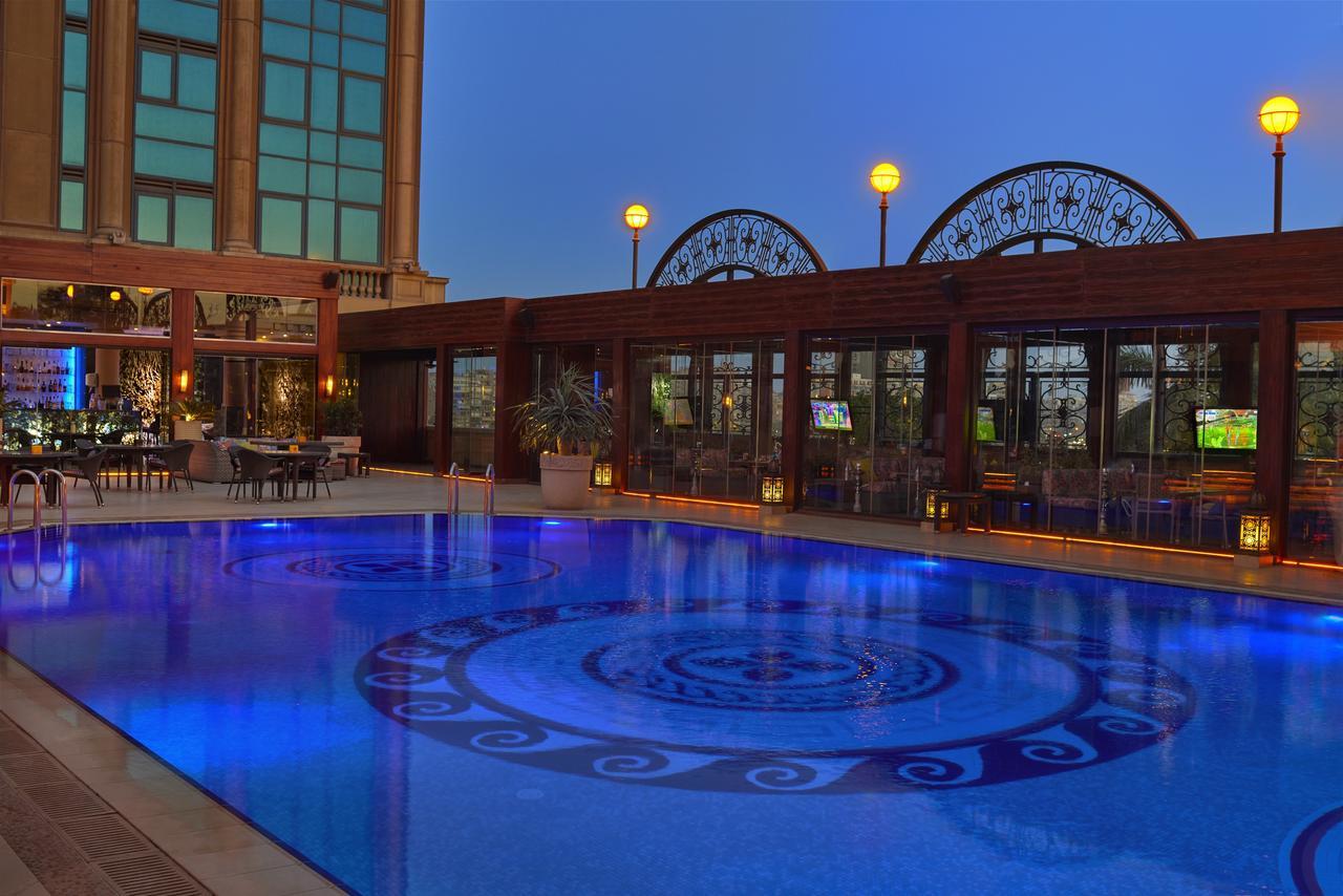 Four Seasons Cairo At The First Residence Giza Dış mekan fotoğraf The pool at the hotel